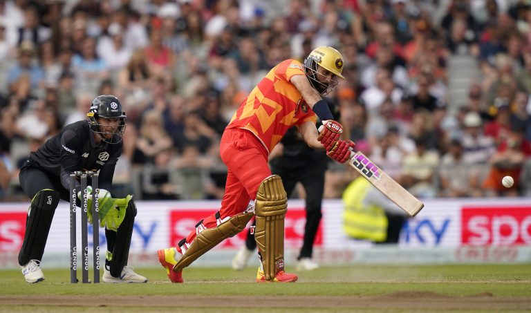 Moeen Ali, right, hits out against Manchester Originals in The Hundred