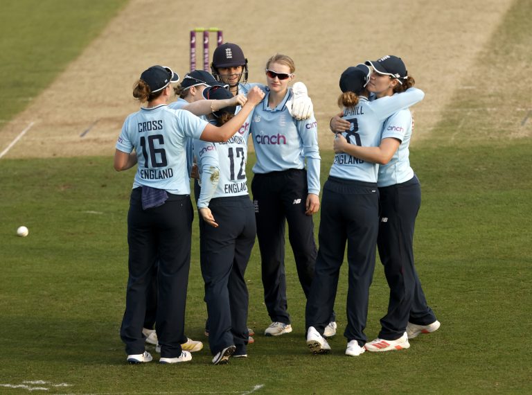 England's Charlie Dean and Tammy Beaumont celebrate with their team-mates