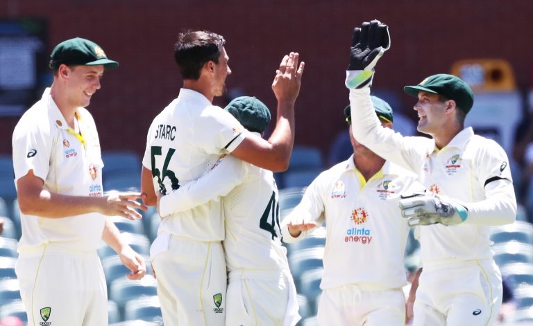 Australia's Mitchell Starc celebrates taking the wicket of England's Ollie Pope