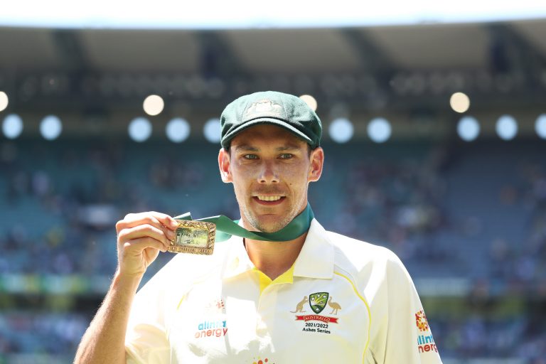 Scott Boland posing with the Mullagh Medal.