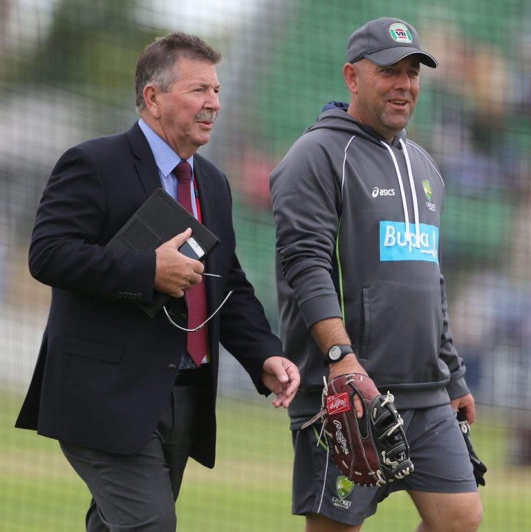 Australia coach Darren Lehmann (right) talks with Marsh after he returned to work for the Baggy Green
