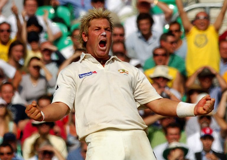 Australia's Shane Warne celebrates after he caught and bowled England's Andrew Flintoff for eight runs during the final day of the fifth npower Test match at the Oval in September 2005