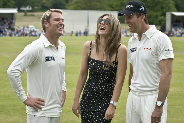 Shane Warne shares a joke with Elizabeth Hurley and England's Michael Vaughan