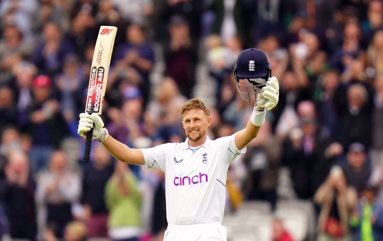 Joe Root celebrates reaching his century