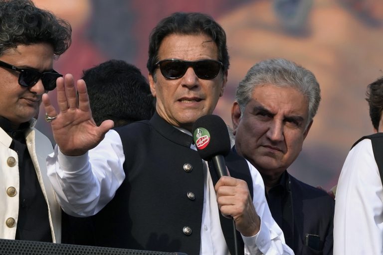Former Pakistan Prime Minister Imran Khan, centre, was injured in a deadly gun attack on Thursday (K.M. Chaudary/AP)