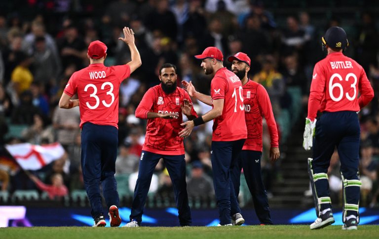 Adil Rashid, centre, took his first tournament wicket (Dan Himbrechts/PA)