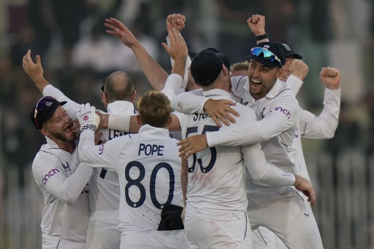 England celebrate their win in the first Test