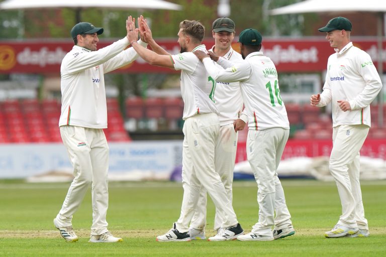 Leicestershire's Wiaan Mulder (centre) celebrates the wicket of Steve Smith