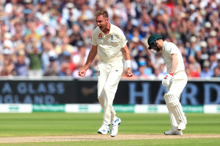 Stuart Broad celebrates taking the wicket of Australia's David Warner, right, at Edgbaston in 2019 