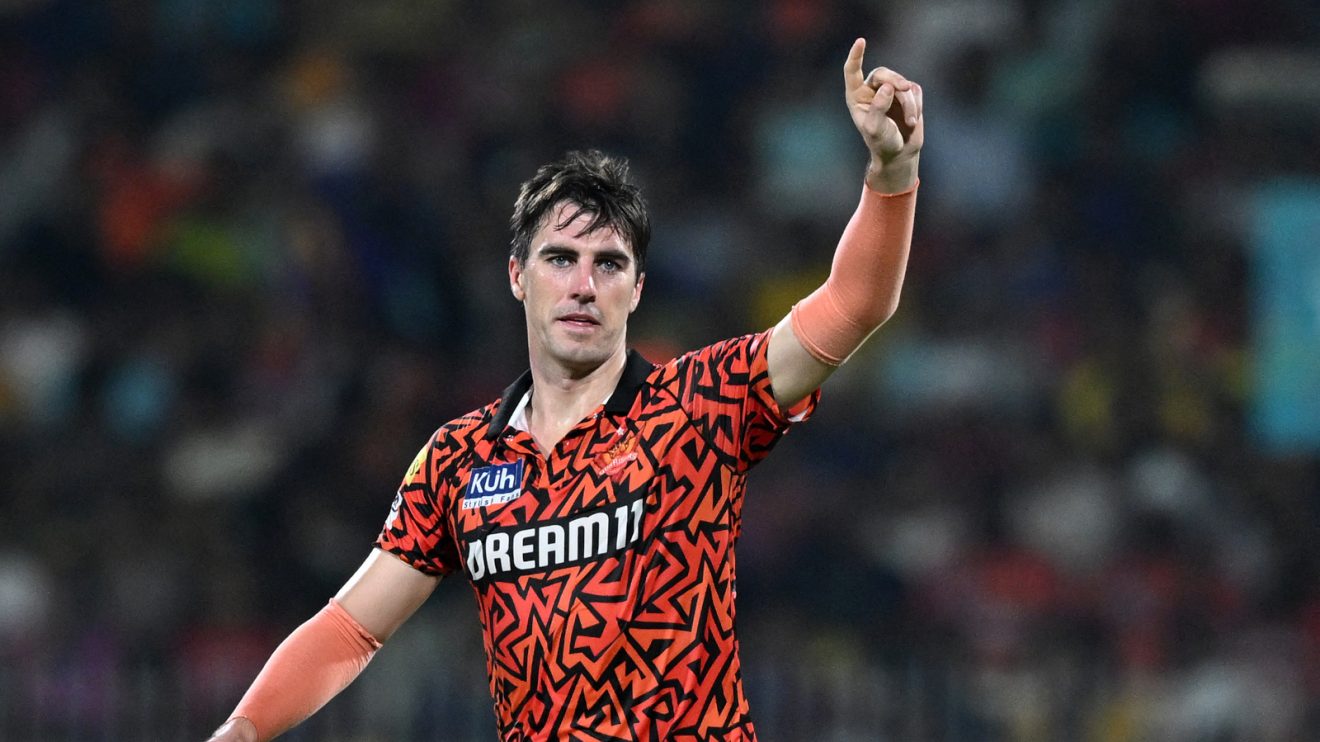Pat Cummins bowls in the IPL