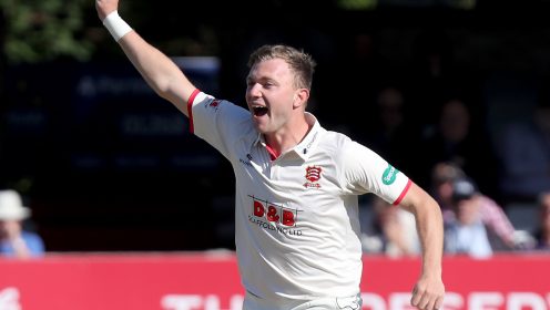 Sam Cook celebrates in cricket