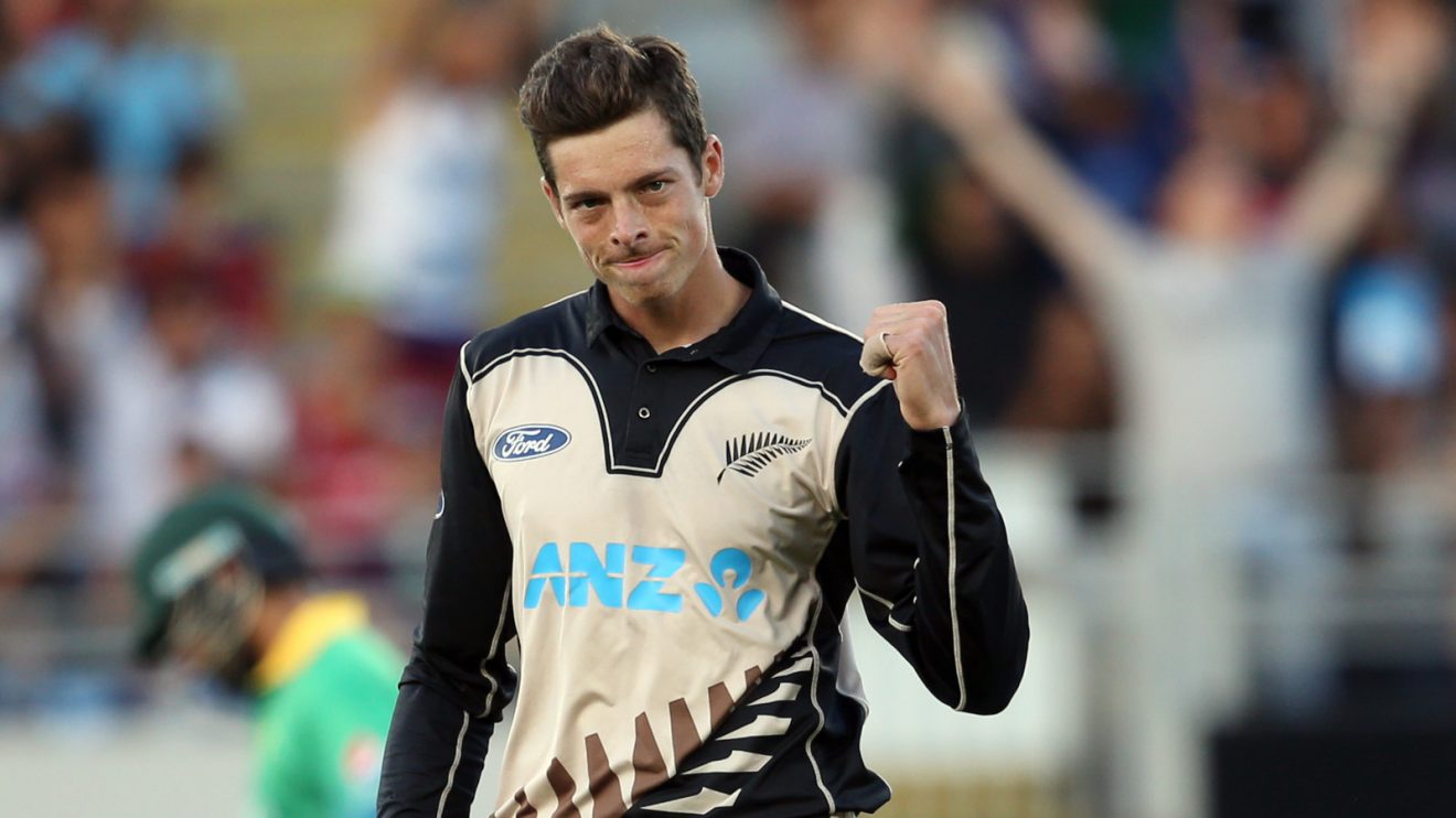 Mitchell Santner celebrates