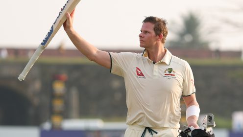 Steven Smith raises his bat