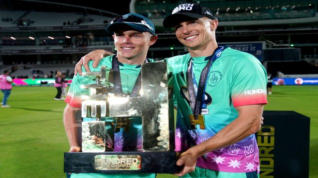 Oval Invincibles Sam Curran and Tom Curran with 2024 Hundred Trophy