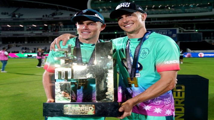 Oval Invincibles Sam Curran and Tom Curran with 2024 Hundred Trophy
