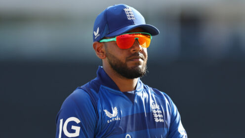 Rehan Ahmed looks on