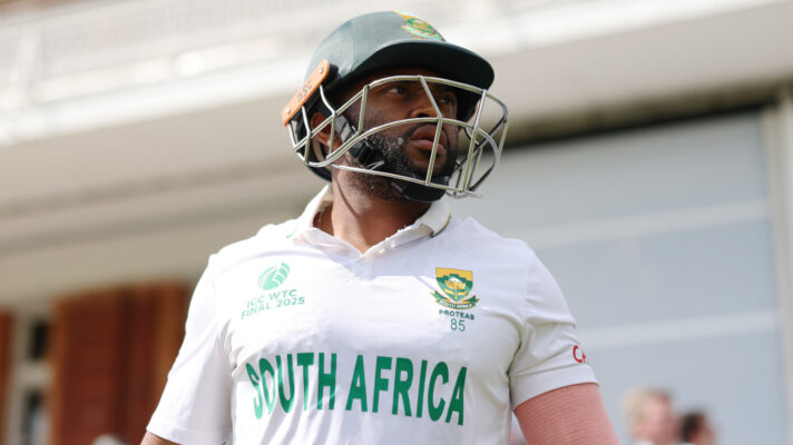 Temba Bavuma looks on