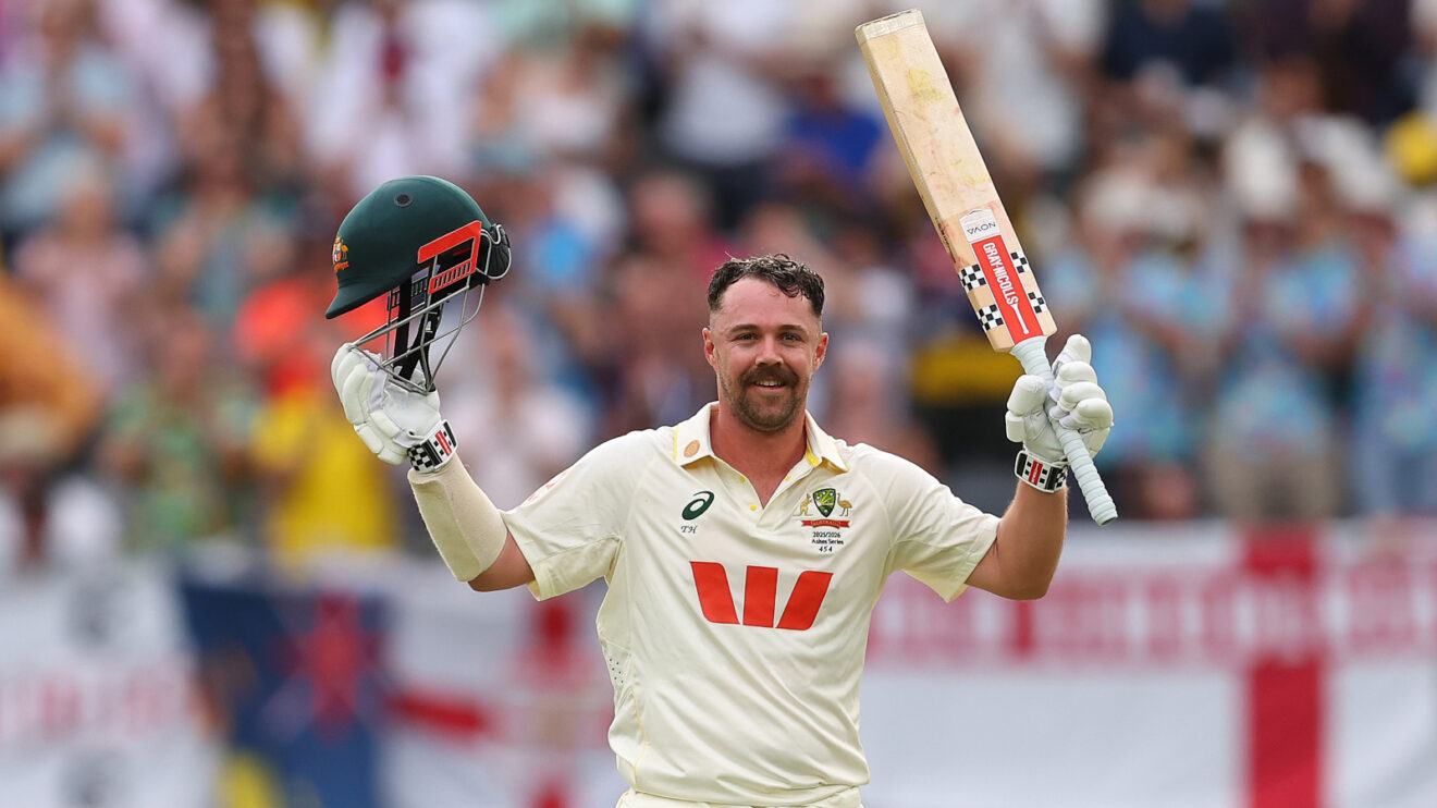 Travis Head celebrates