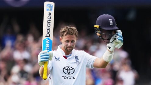 Joe Root celebrates a hundred