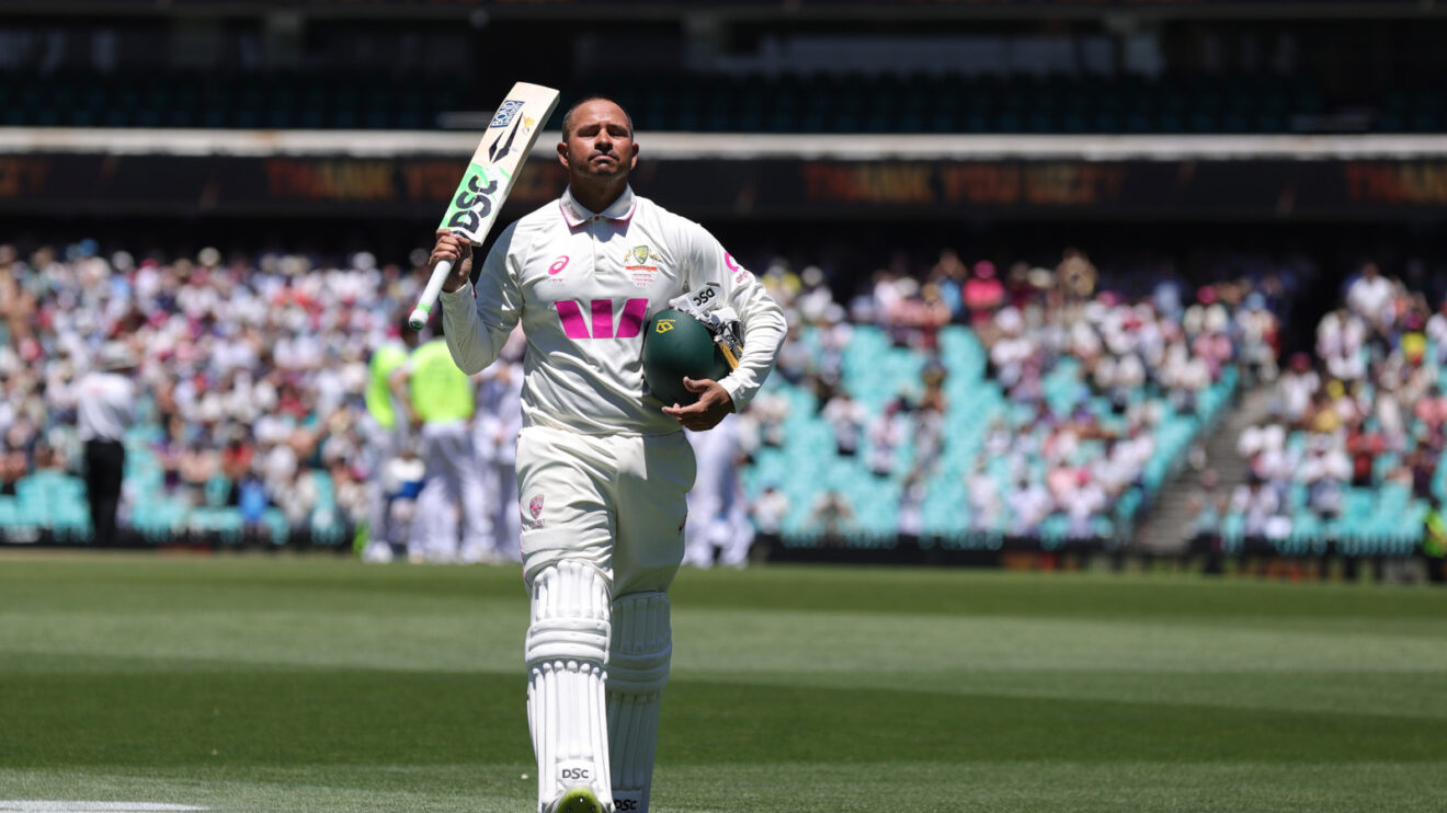 Usman Khawaja walks