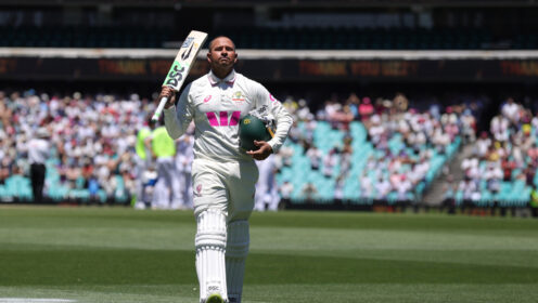 Usman Khawaja walks