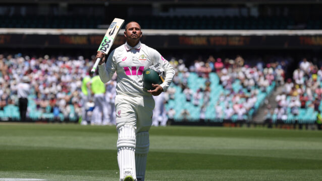 Usman Khawaja walks